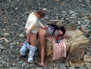 Ultra-cute looking duo having hook-up on the remote beach