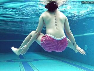 Nymph Dee ultra-cute bashful Czech young woman swimming