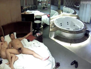 Asian cuple pokes under spycam in motel