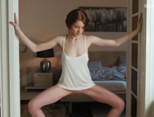 Belarusian ginger-haired Milla opens up her gams