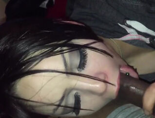 Uber-cute emo young woman with pierced lips fellates big